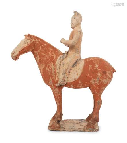 A Chinese Pottery Equestrian Figure TANG DYNASTY (618-907)