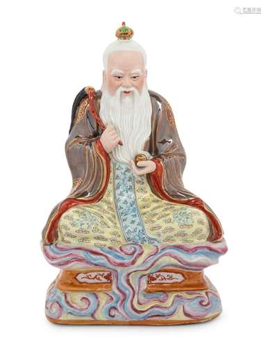 A Chinese Famille Rose Porcelain Figure of Daoist Immortal, ...