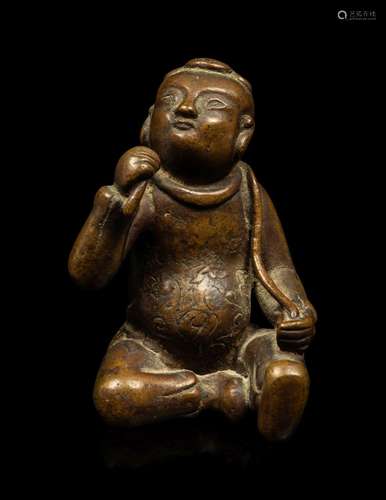 A Small Chinese Bronze Figure of a Seated Boy