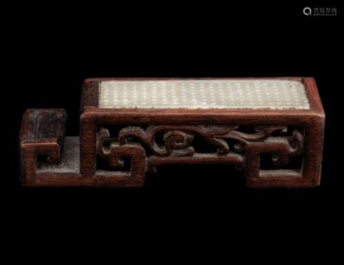 A Chinese Celadon Jade Sword Fitting Mounted as Ink-Cake Sta...