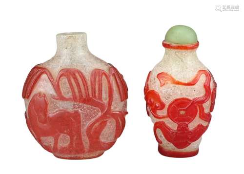 TWO CHINESE GLASS SNUFF BOTTLES. To include a red-overlay gl...