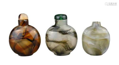 THREE CHINESE GLASS SNUFF BOTTLES. Coloured glass imitation ...