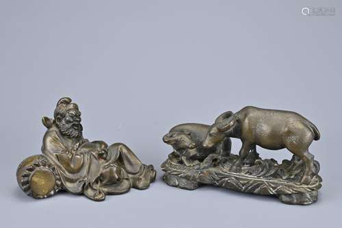 TWO CHINESE BRONZE FIGURES, EARLY 20TH CENTURY. One figure o...