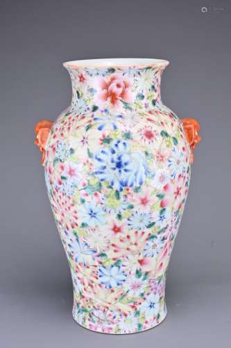 A CHINESE MILLE FLEUR PORCELAIN VASE, EARLY 20TH CENTURY. Wi...