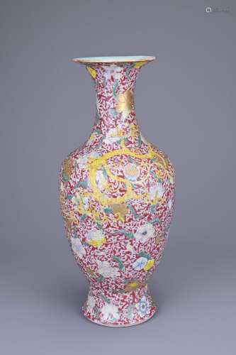 A CHINESE RUBY-GROUND FAMILLE ROSE ENAMELLED CHILONG VASE. F...