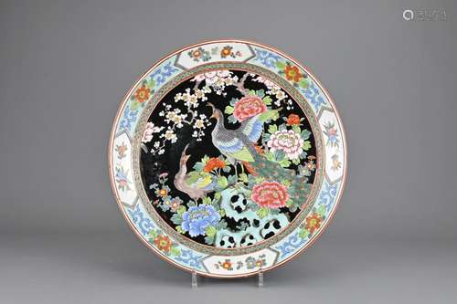 A JAPANESE ARITA YAMATOKU PORCELAIN CHARGER, EARLY 20TH CENT...