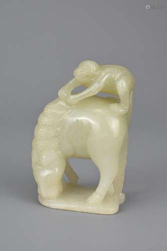 A CHINESE PALE CELADON JADE CARVING OF MONKEY ON HORSE. 7.3c...