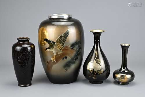 FOUR VINTAGE JAPANESE METALWARE VASES, 20TH CENTURY. Of vari...