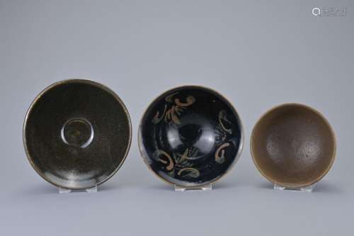 THREE CHINESE CIZHOU BLACK AND BROWN GLAZED TEA BOWLS, SONG ...