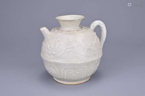 A CHINESE QINGBAI GLAZED POTTERY EWER, YUAN DYNASTY. The sma...