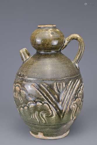 A CARVED GOURD-SHAPED CELADON EWER, SONG - JIN DYNASTY OR LA...