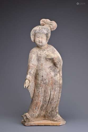 A CHINESE PAINTED POTTERY FIGURE OF A COURT LADY, TANG DYNAS...