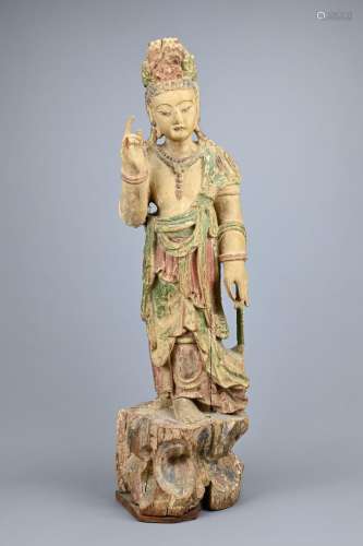 A TALL CHINESE CARVED PAINTED WOODEN FIGURE OF GUANYIN, QING...
