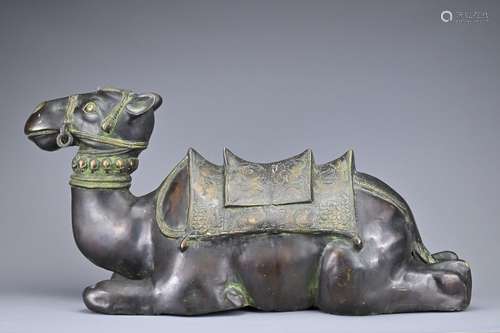 A LARGE INDIAN CAST BRONZE FIGURE OF A RECUMBENT CAMEL. Heav...