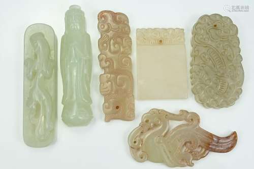 SIX CHINESE JADE PENDANTS. Of various forms to include a sta...