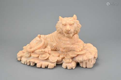 A CHINESE VINTAGE STONE CARVING OF A TIGER, 20TH CENTURY. Re...