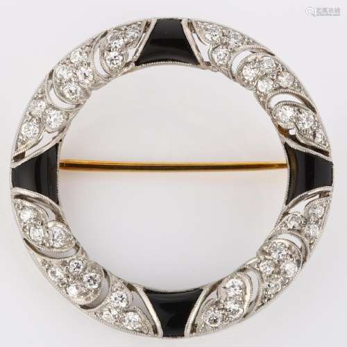 TIFFANY & CO - an Art Deco onyx and diamond brooch, unma...