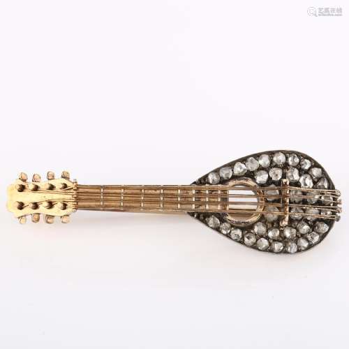 An Antique novelty diamond mandolin musical instrument brooc...