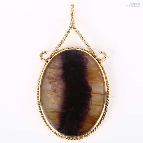 A late 20th century 9ct gold Blue John pendant, oval cabocho...
