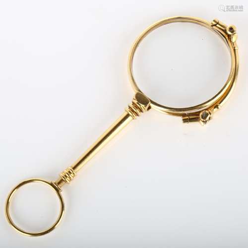 A pair of 19th century French gold lorgnettes, with ring tur...