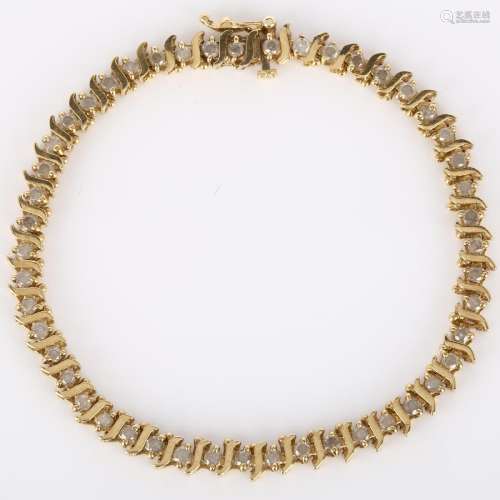A modern 9ct gold diamond tennis line bracelet, set with mod...