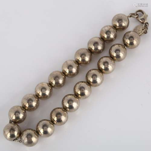 TIFFANY & CO - a modern sterling silver bead bracelet, l...