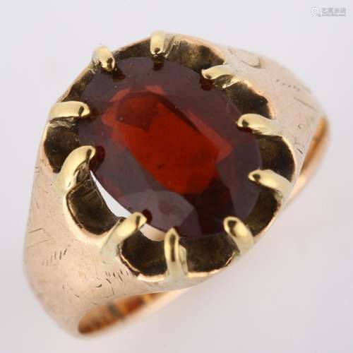 An early 20th century 9ct rose gold garnet dress ring, set w...