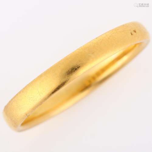 An early 20th century 22ct gold wedding band ring, maker`s m...