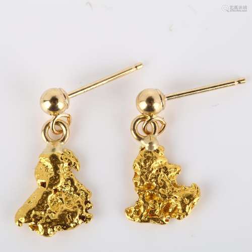 A pair of gold nugget drop earrings, with 14ct stud fittings...