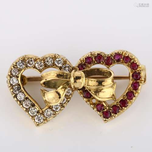 A late 20th century 18ct gold ruby and diamond double-heart ...