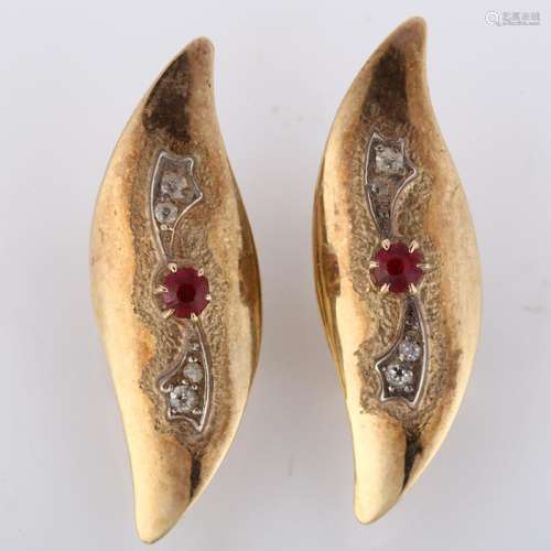 A pair of 9ct gold garnet and diamond earrings, polished fea...