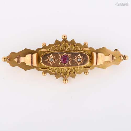 An early 20th century 9ct rose gold Etruscan Revival brooch,...