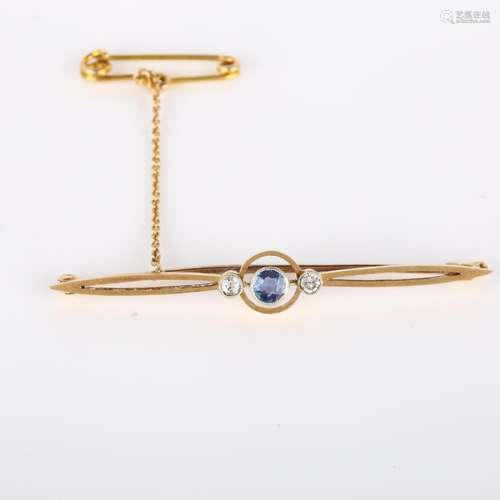 An Art Deco 15ct gold three stone sapphire and diamond bar b...