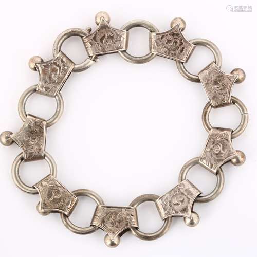 A Victorian fancy link chain bracelet, unmarked silver setti...