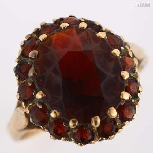 A late 20th century 9ct gold garnet cluster dress ring, sett...