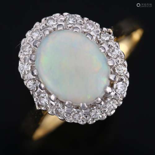 An 18ct gold opal and diamond cluster ring, set with oval ca...