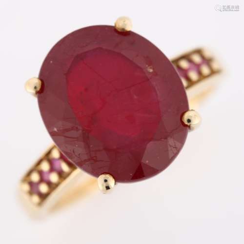 A modern 9ct gold ruby dress ring, with ruby shoulders, ruby...