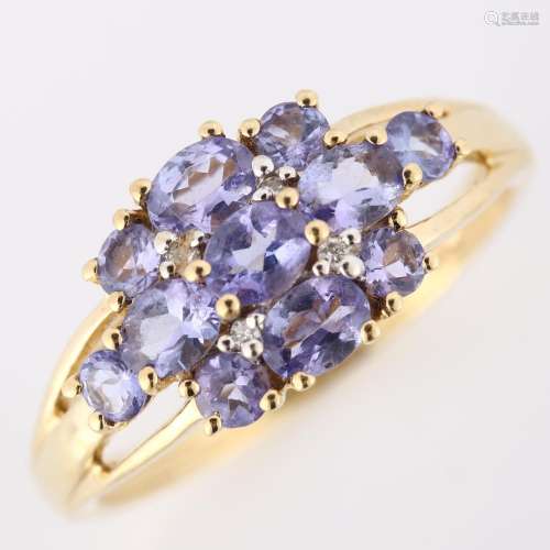 A modern 9ct gold tanzanite dress ring, set with oval mixed-...