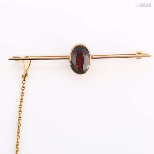 An early 20th century garnet bar brooch, unmarked rose gold ...