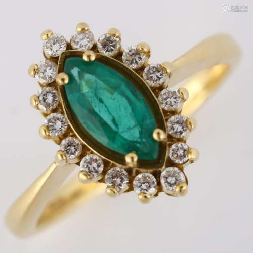 An 18ct gold emerald and diamond marquise cluster ring, set ...