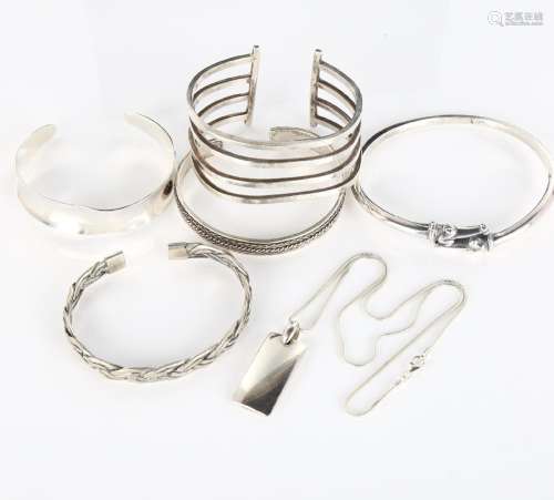 5 Continental silver bangles, and a pendant necklace, makers...