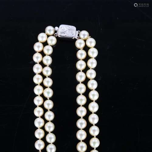 A Vintage double-strand cultured pearl necklace, with 9ct wh...