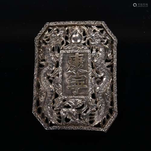 A Chinese dragon belt buckle, unmarked white metal settings ...