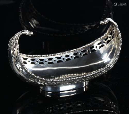 GARRARD & CO LTD - a George V silver gondola sweetmeat d...