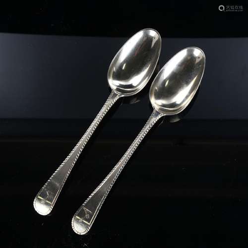 A pair of silver feather-edge Old English pattern tablespoon...