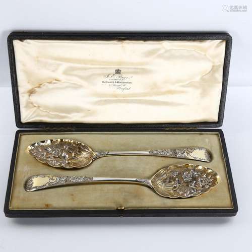 A pair of George III silver Old English pattern berry spoons...