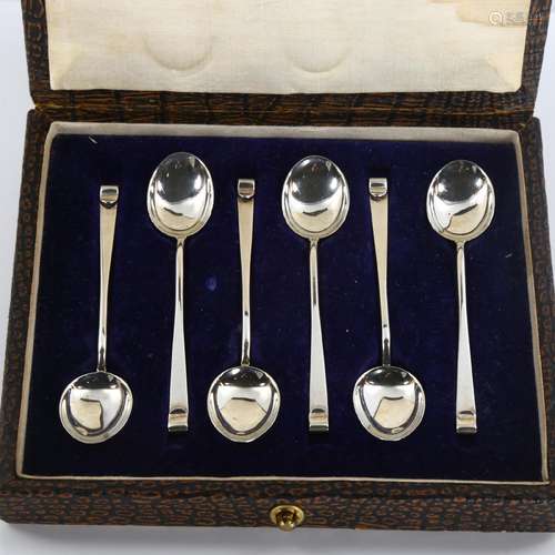 A set of 6 Arts and Crafts George V silver coffee spoons, by...