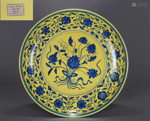 A Chinese Yellow Ground and Underglaze Blue Lotus Bouquet Pl...
