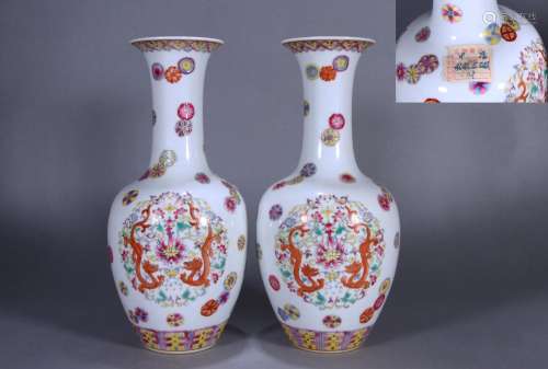 PAIR OF CHINESE PORCELAIN FAMILLE ROSE DOUBLE DRAGON VASES