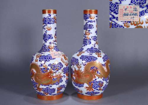 PAIR OF CHINESE PORCELAIN BLUE AND WHITE RED IRON DRAGON VAS...